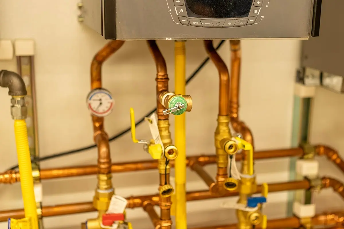 Licensed technician providing Slab Leak Repair for a homeowner in Rochester